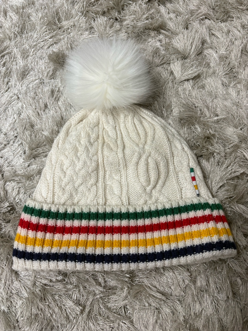 Hudson Bay adult Cream Knit Pom Beanie with Multicolor Stripe Cuff